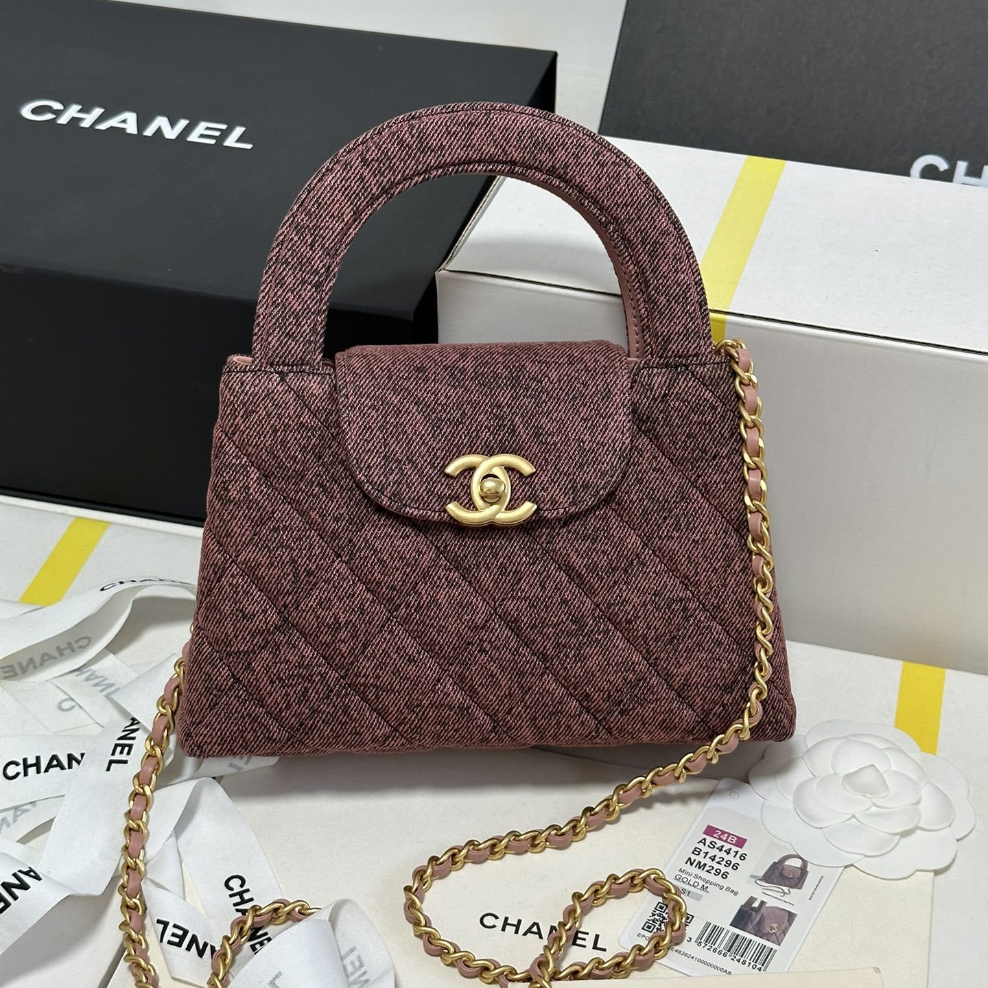 Chanel Mini Shopping Bag in Denim with Monogram Pattern and Turn-lock for Handheld Shoulder Carry