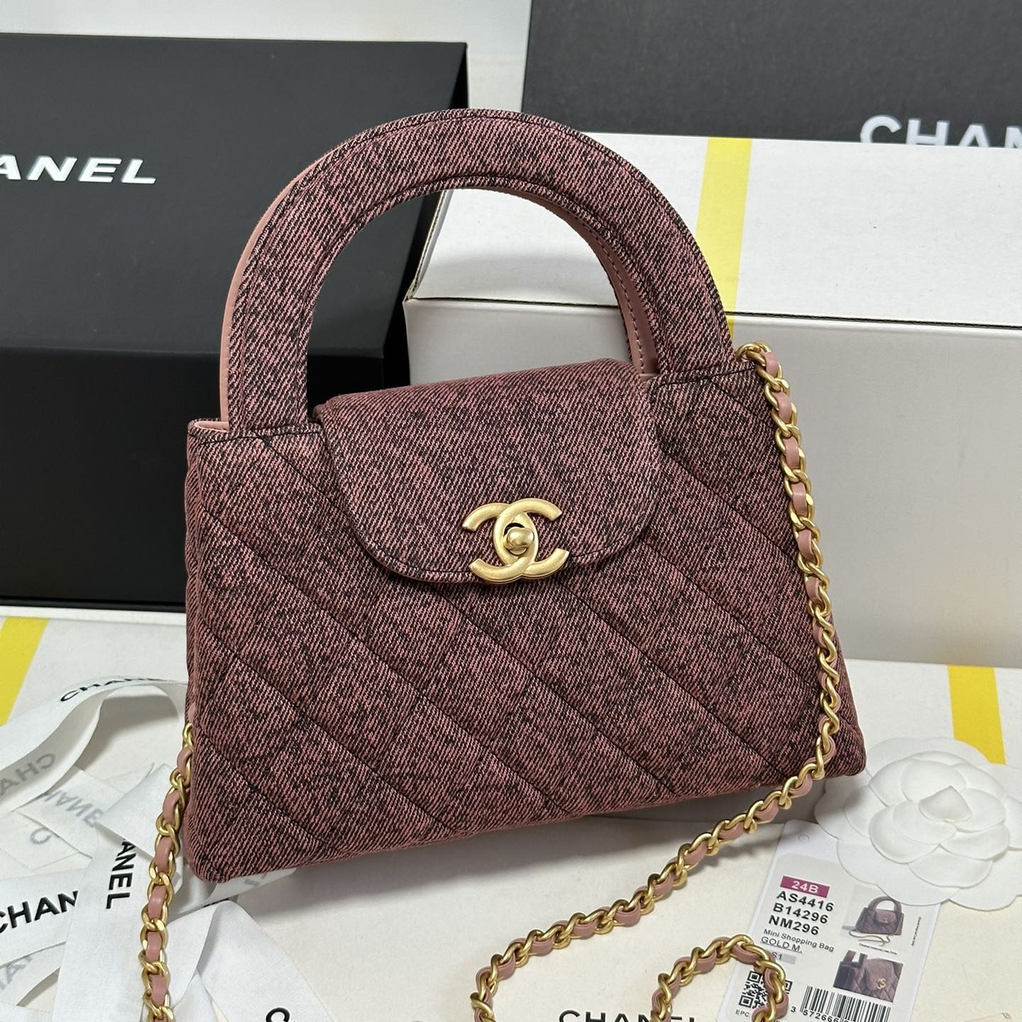 Chanel Mini Shopping Bag in Denim with Monogram Pattern and Turn-lock for Handheld Shoulder Carry