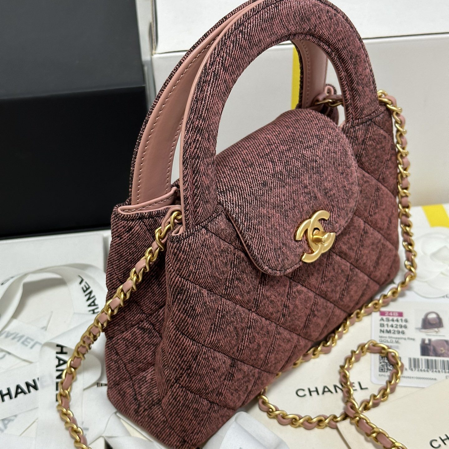 Chanel Mini Shopping Bag in Denim with Monogram Pattern and Turn-lock for Handheld Shoulder Carry