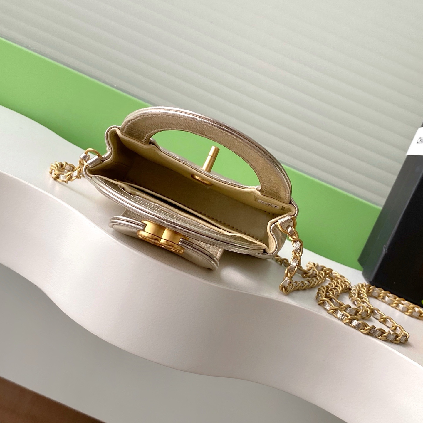 Chanel Kelly Mini Top Handle in Metallic Lambskin with Turn-lock Flap for Handheld and Shoulder
