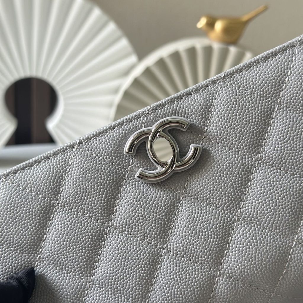 Chanel Top Handle WOC (Wallet on Chain) in Caviar Leather with Turn-lock Flap Closure for HandheldSh