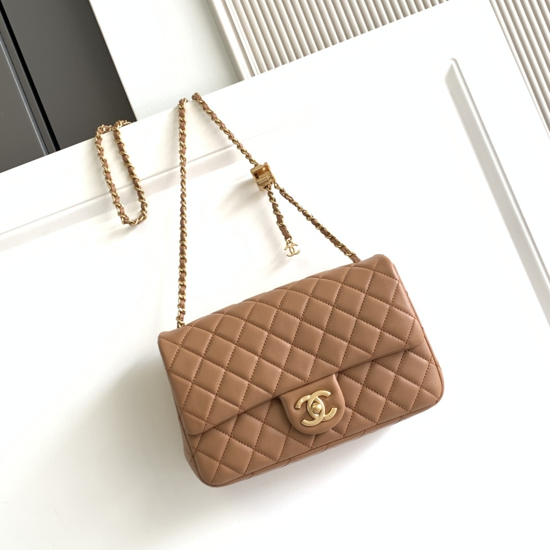Chanel Classic Flap in Caviar Leather with Turn-lock for Shoulder Crossbody Carry Medium