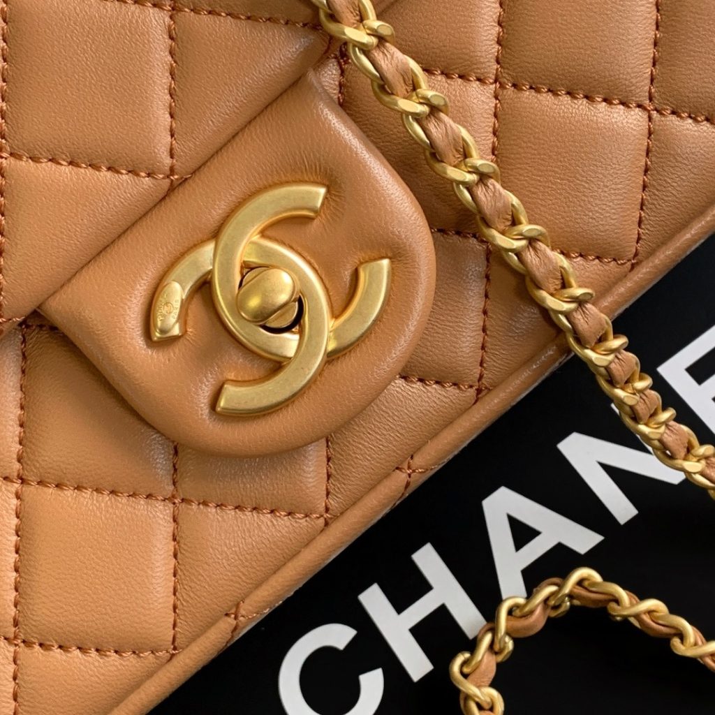 Chanel Classic Flap in Caviar Leather with Turn-lock for Shoulder Crossbody Carry Medium
