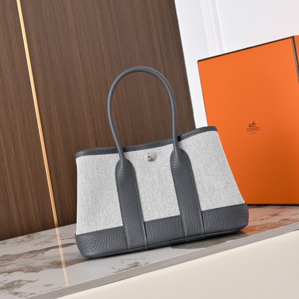 Hermès Picotin Lock in Canvas and Togo Leather with Magnetic Snap for Handheld Carry