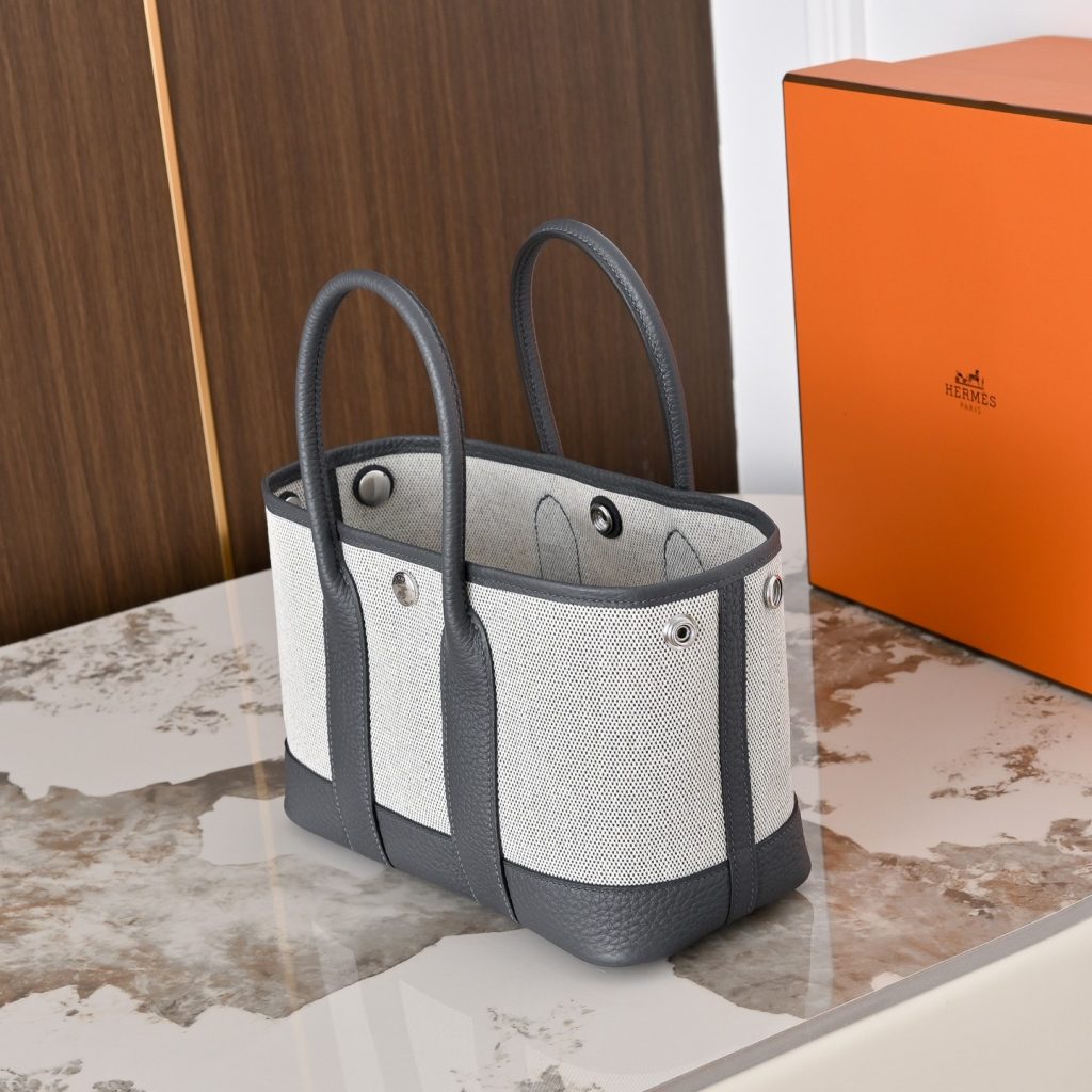 Hermès Picotin Lock in Canvas and Togo Leather with Magnetic Snap for Handheld Carry