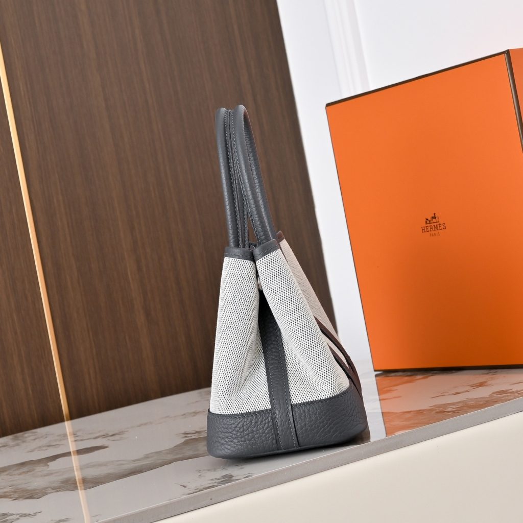 Hermès Picotin Lock in Canvas and Togo Leather with Magnetic Snap for Handheld Carry