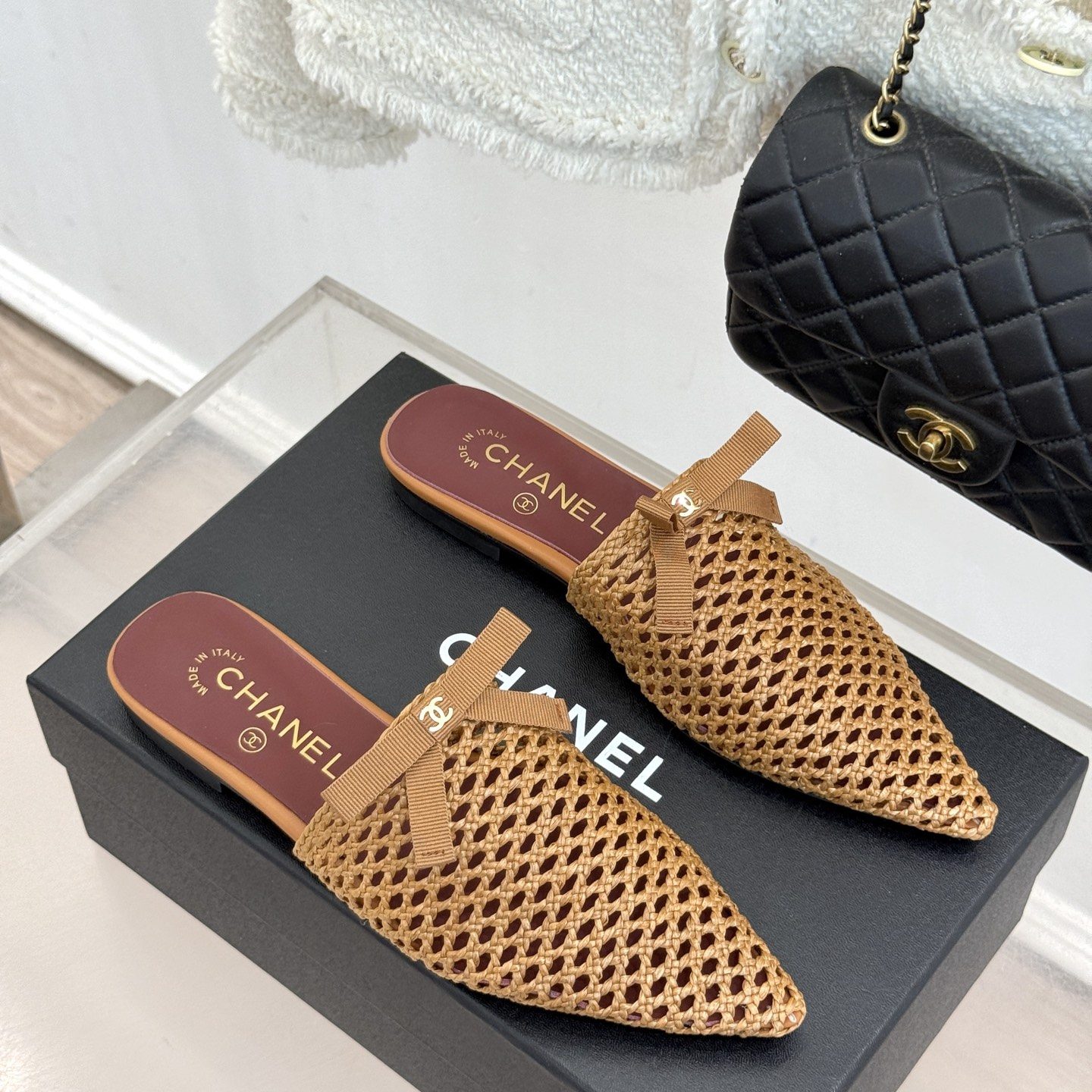CHANEL CC Logo Bow Woven Pointed Toe Flat Mule in Full-grain Lambskin with Italian Leather Sole