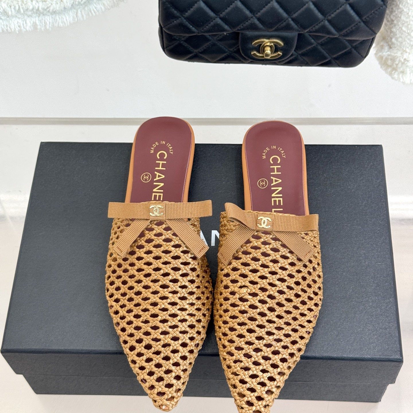 CHANEL CC Logo Bow Woven Pointed Toe Flat Mule in Full-grain Lambskin with Italian Leather Sole