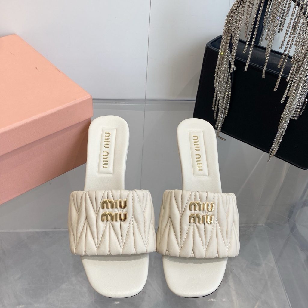 Miu Miu Quilted Flat Sandals in Lambskin with Metal Logo