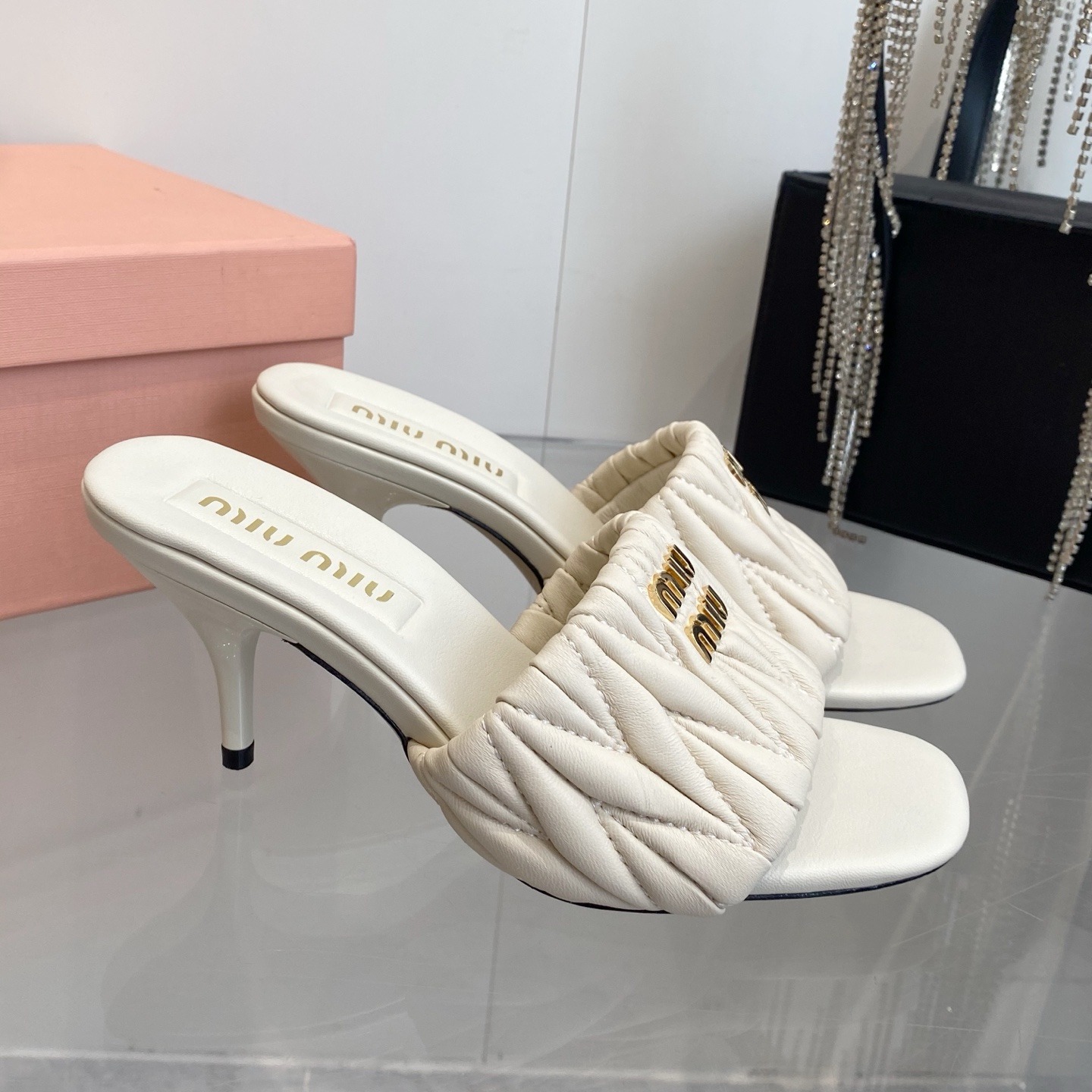 Miu Miu Quilted Flat Sandals in Lambskin with Metal Logo