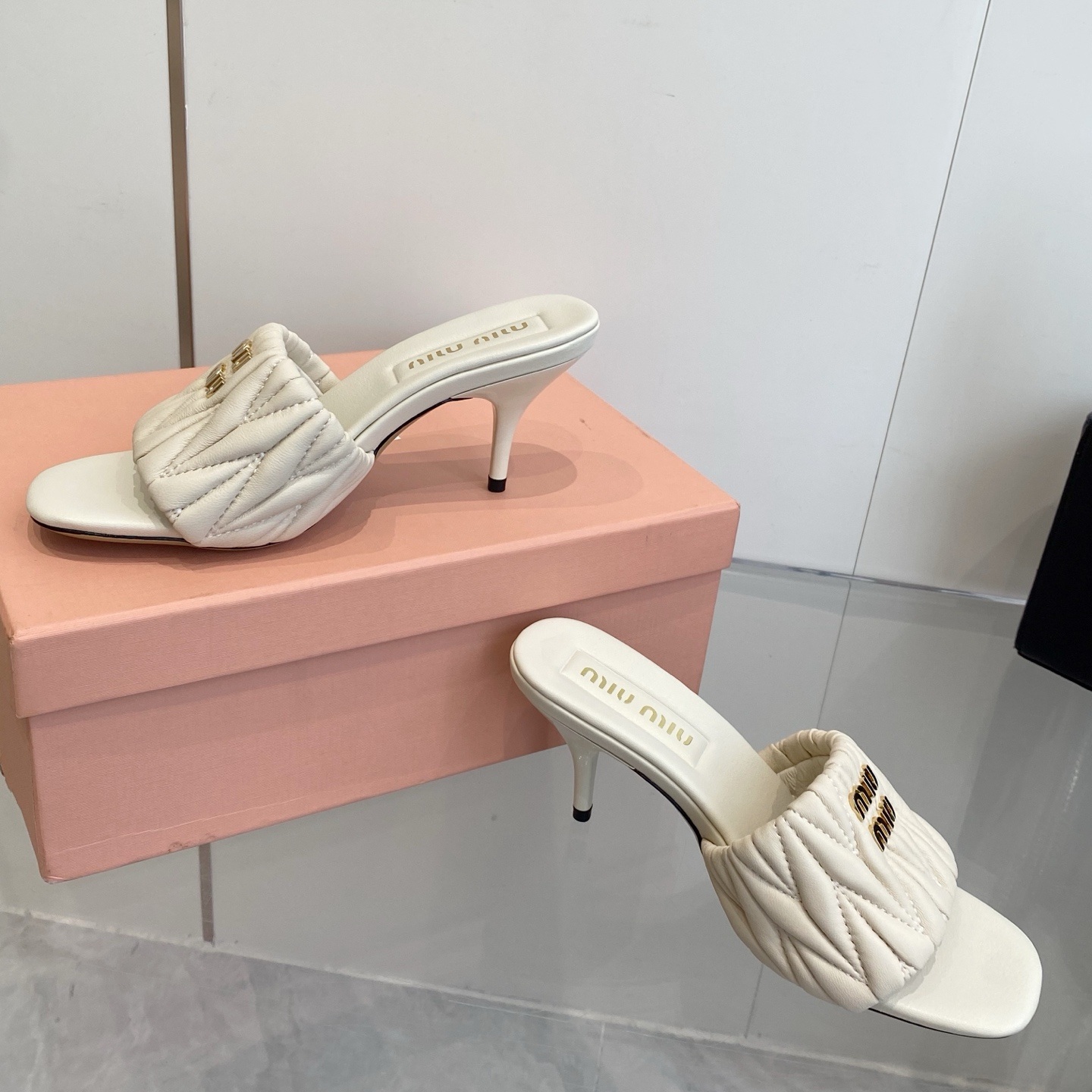 Miu Miu Quilted Flat Sandals in Lambskin with Metal Logo