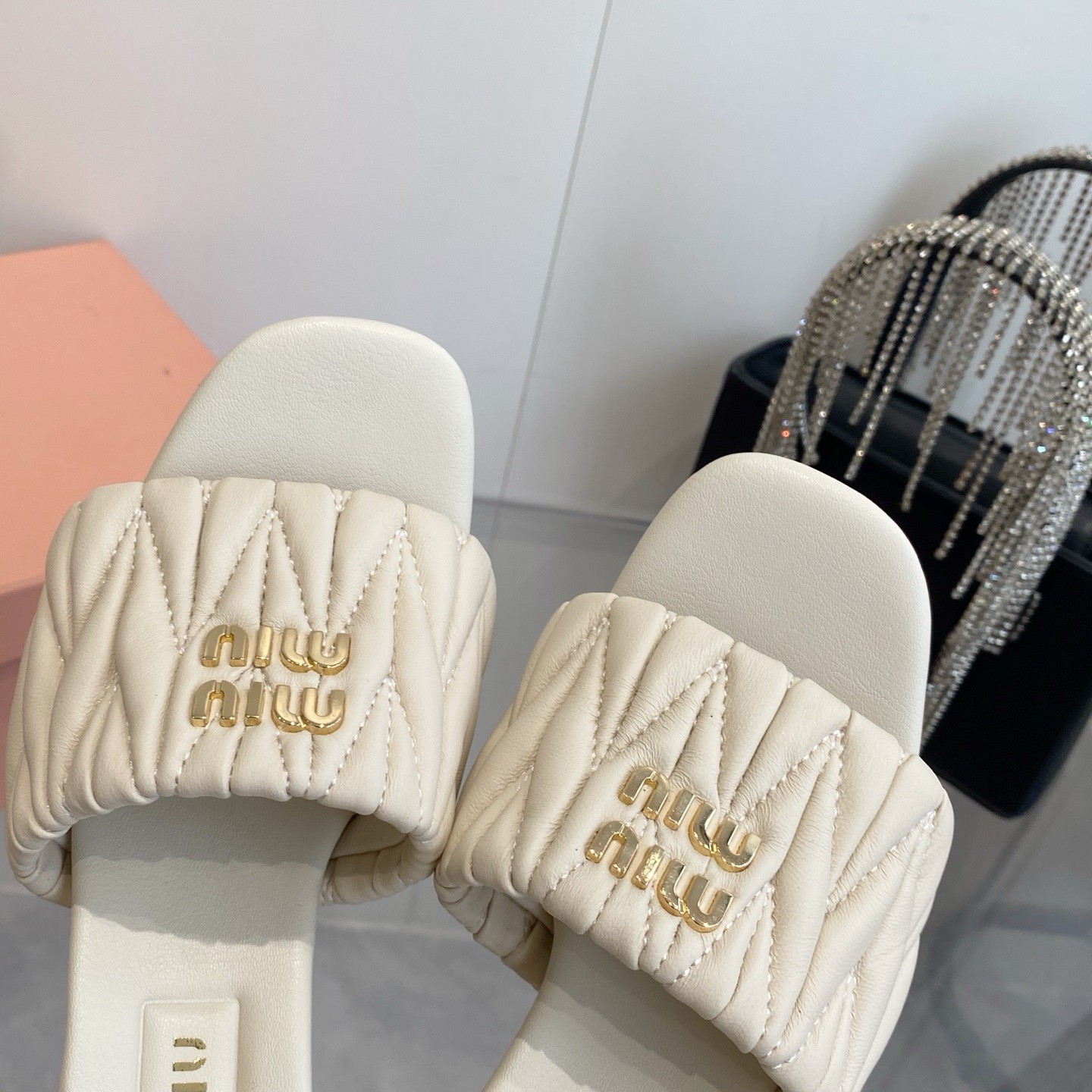 Miu Miu Quilted Flat Sandals in Lambskin with Metal Logo
