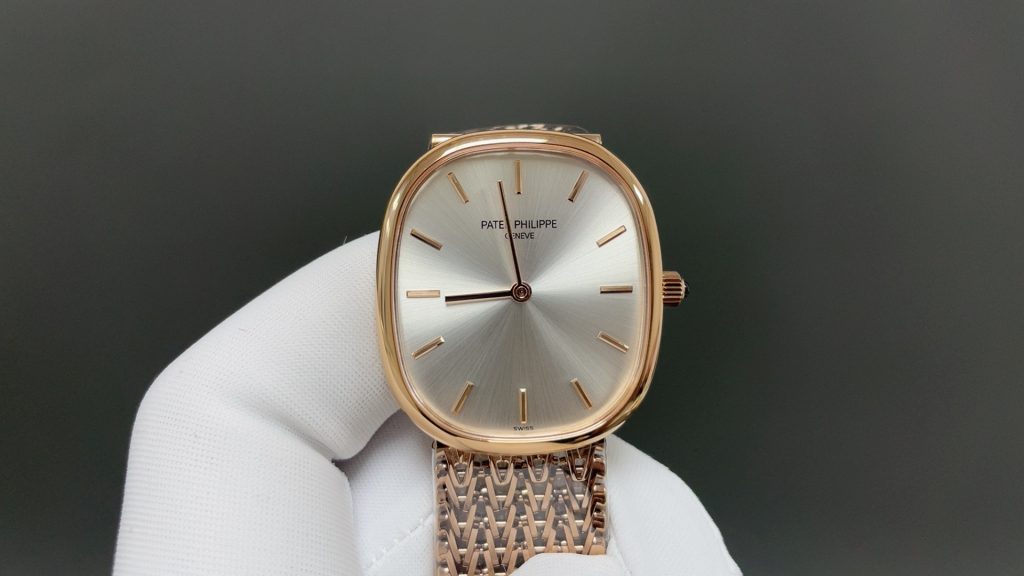 Patek Philippe Vintage Oval Watch, Silver Dial Rose-Gold Woven Bracelet