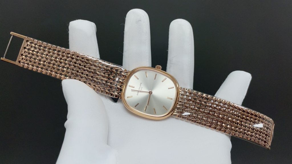 Patek Philippe Vintage Oval Watch, Silver Dial Rose-Gold Woven Bracelet