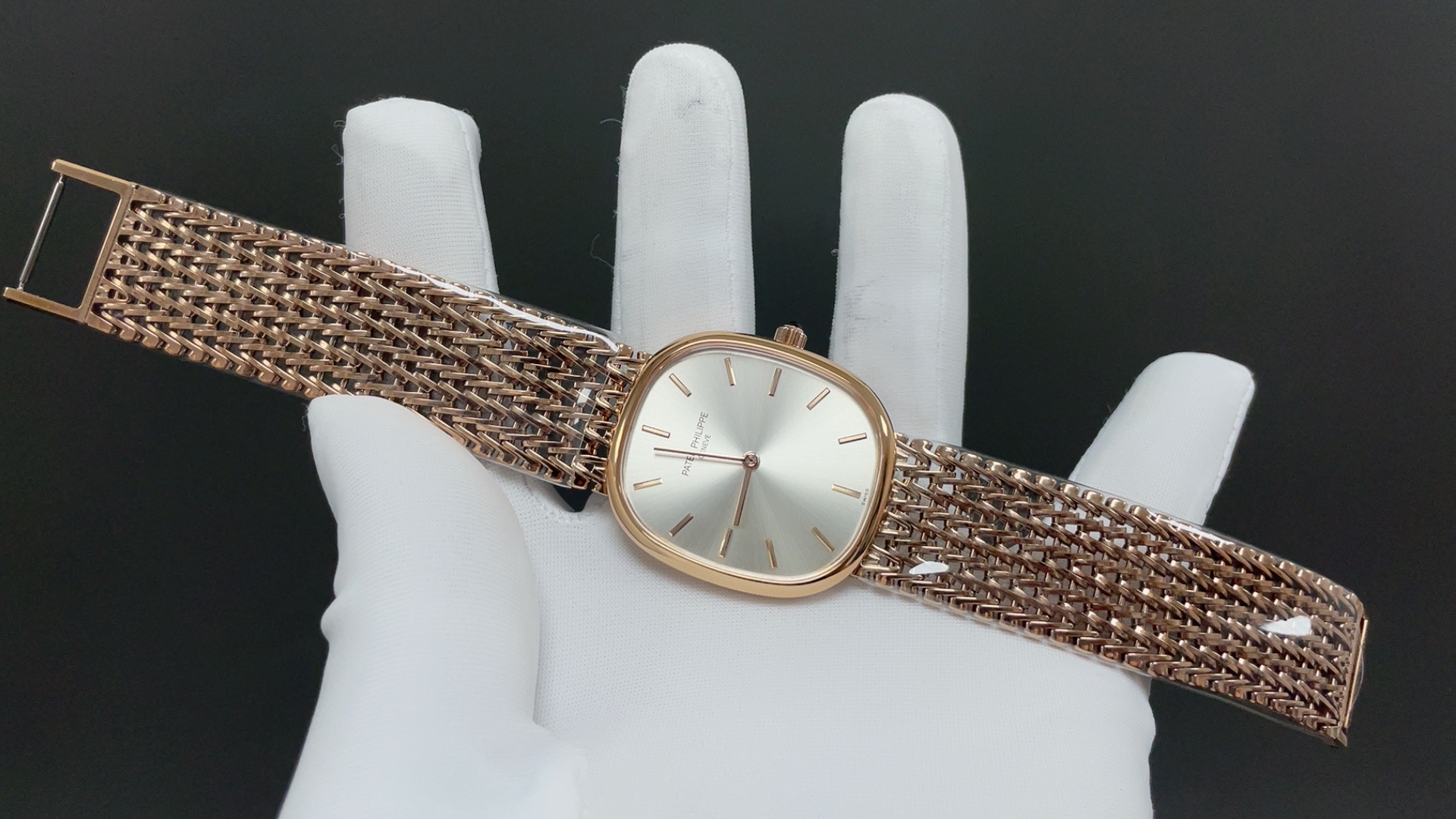 Patek Philippe Vintage Oval Watch, Silver Dial Rose-Gold Woven Bracelet
