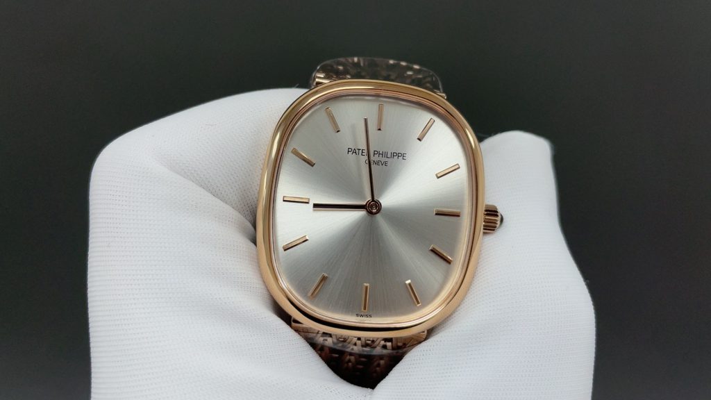 Patek Philippe Vintage Oval Watch, Silver Dial Rose-Gold Woven Bracelet