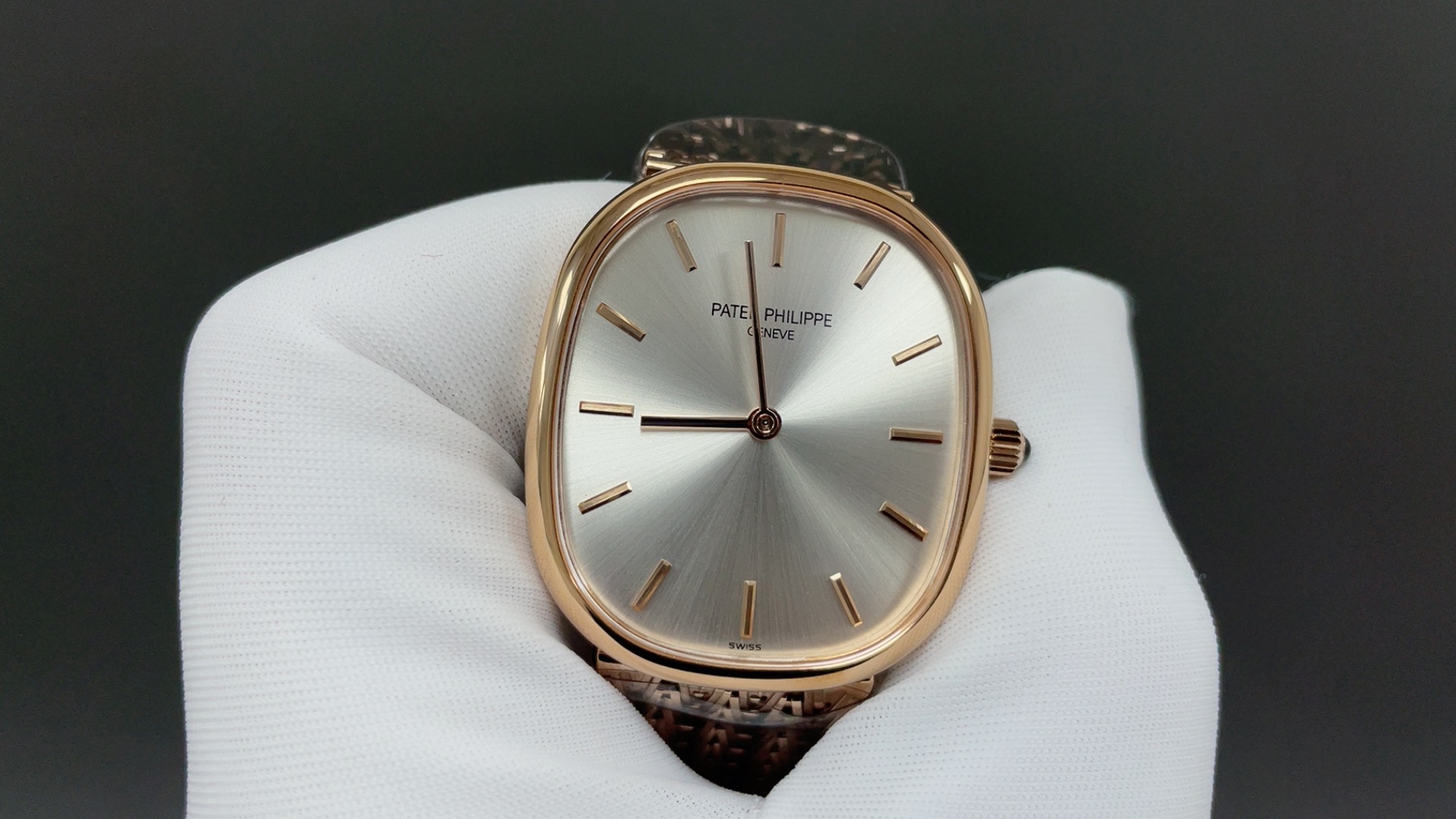 Patek Philippe Vintage Oval Watch, Silver Dial Rose-Gold Woven Bracelet