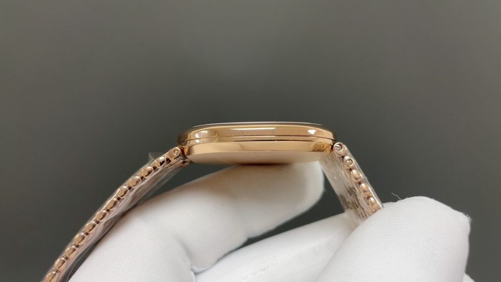 Patek Philippe Vintage Oval Watch, Silver Dial Rose-Gold Woven Bracelet