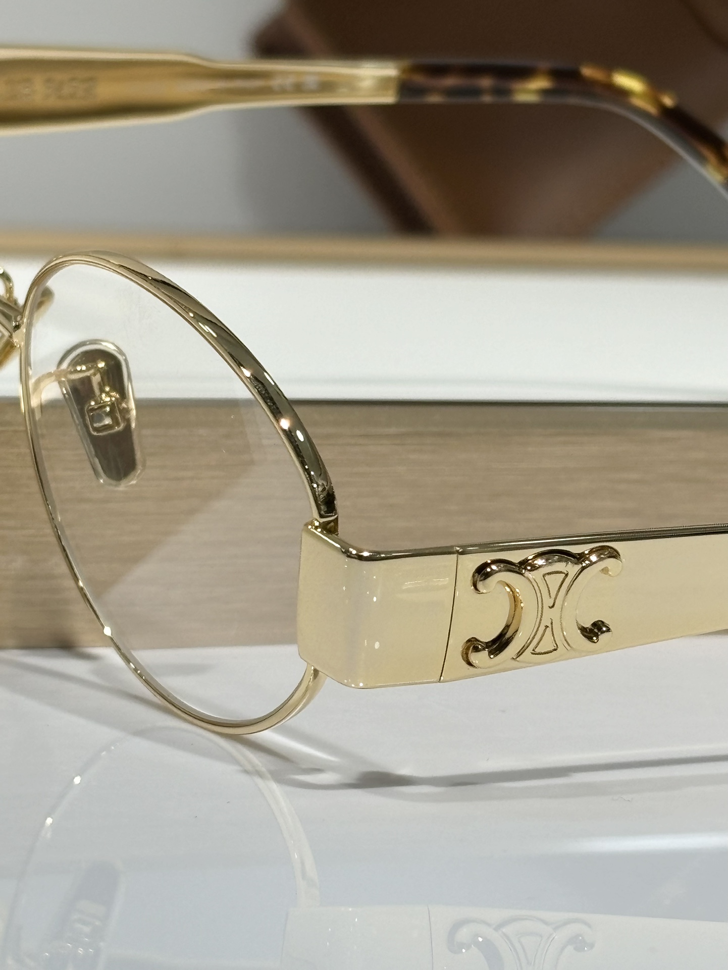 Celine Sunglasses Metal, Acetate Oval metal frame with tortoiseshell temple tips and C-logo hinge