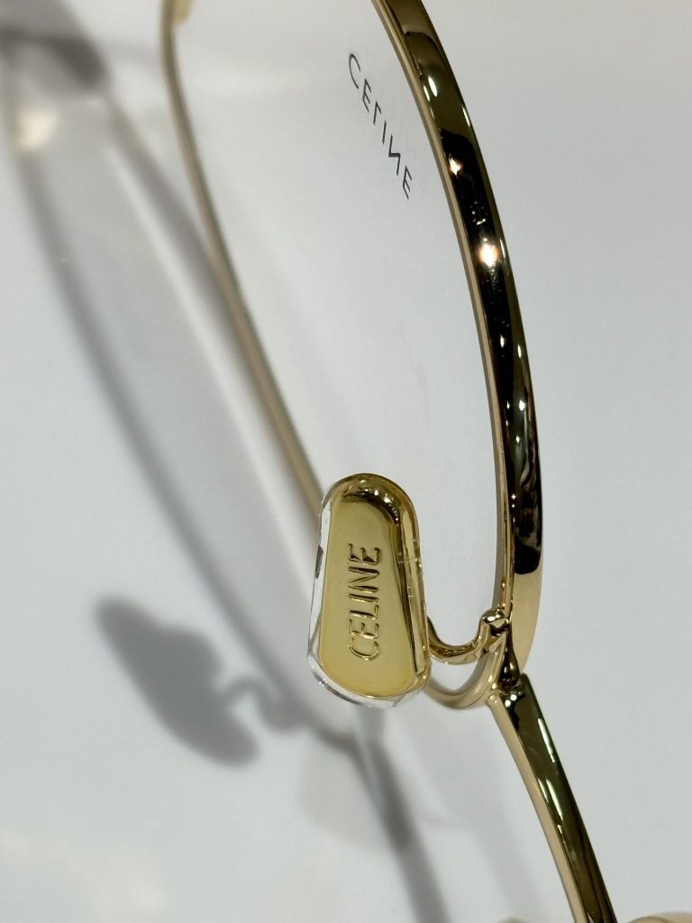 Celine Sunglasses Metal, Acetate Oval metal frame with tortoiseshell temple tips and C-logo hinge